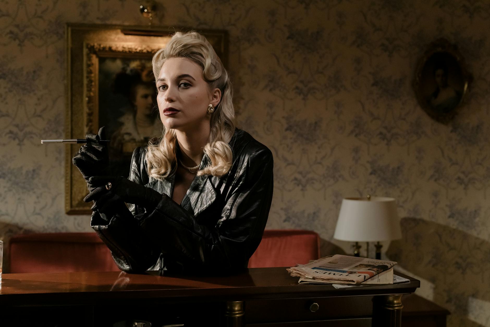 Elegant woman in a vintage noir setting with glamorous attire and a mysterious allure.