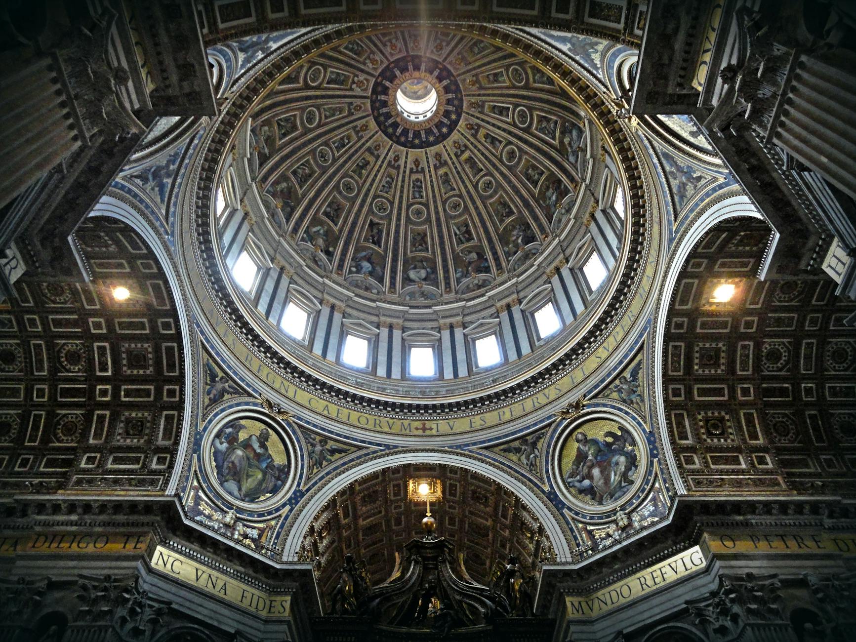 Marvel at the detailed interior dome of St. Peter's Basilica, showcasing breathtaking architecture and historical artistry.