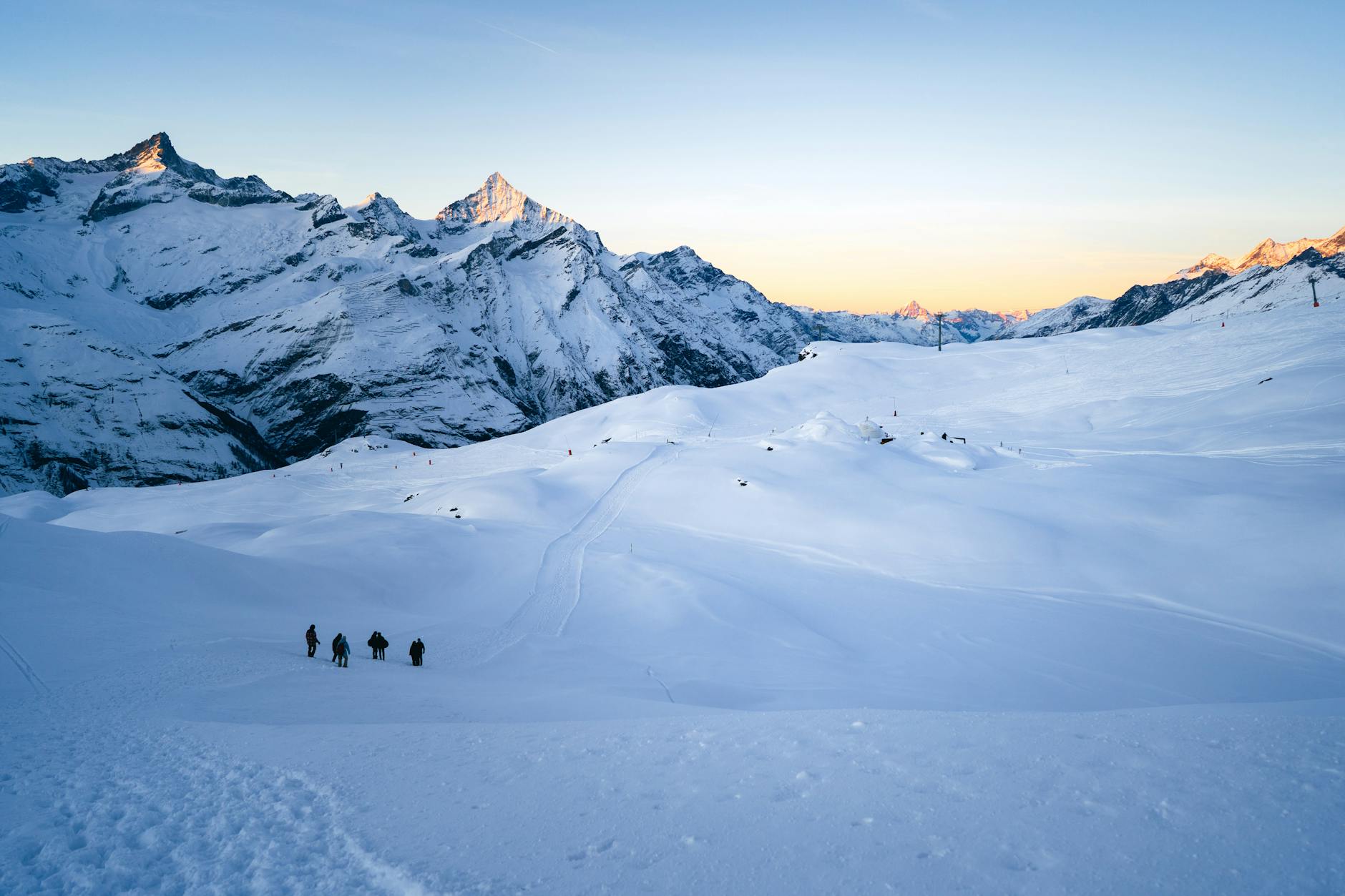 A stunning snowy mountain view in Zermatt, perfect for winter sports enthusiasts enjoying the serene environment.