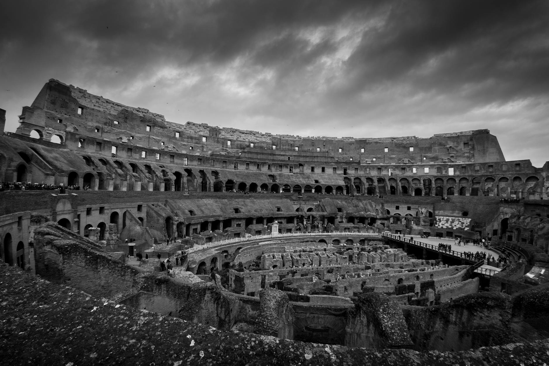 Stunning black and white image of the Colosseum interior in Rome, Italy.