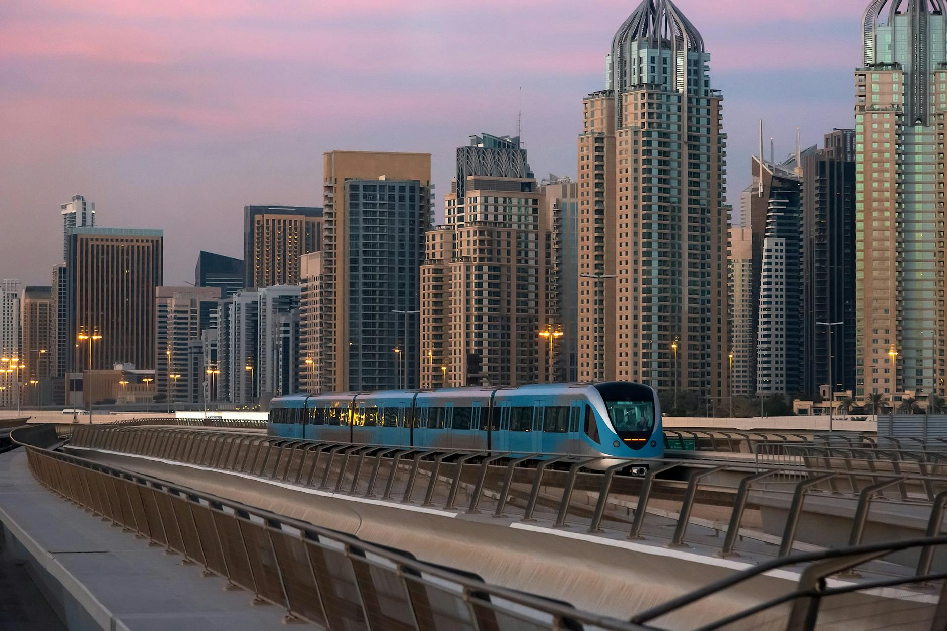 A metro train against the backdrop of an incredible Dubai Skyline