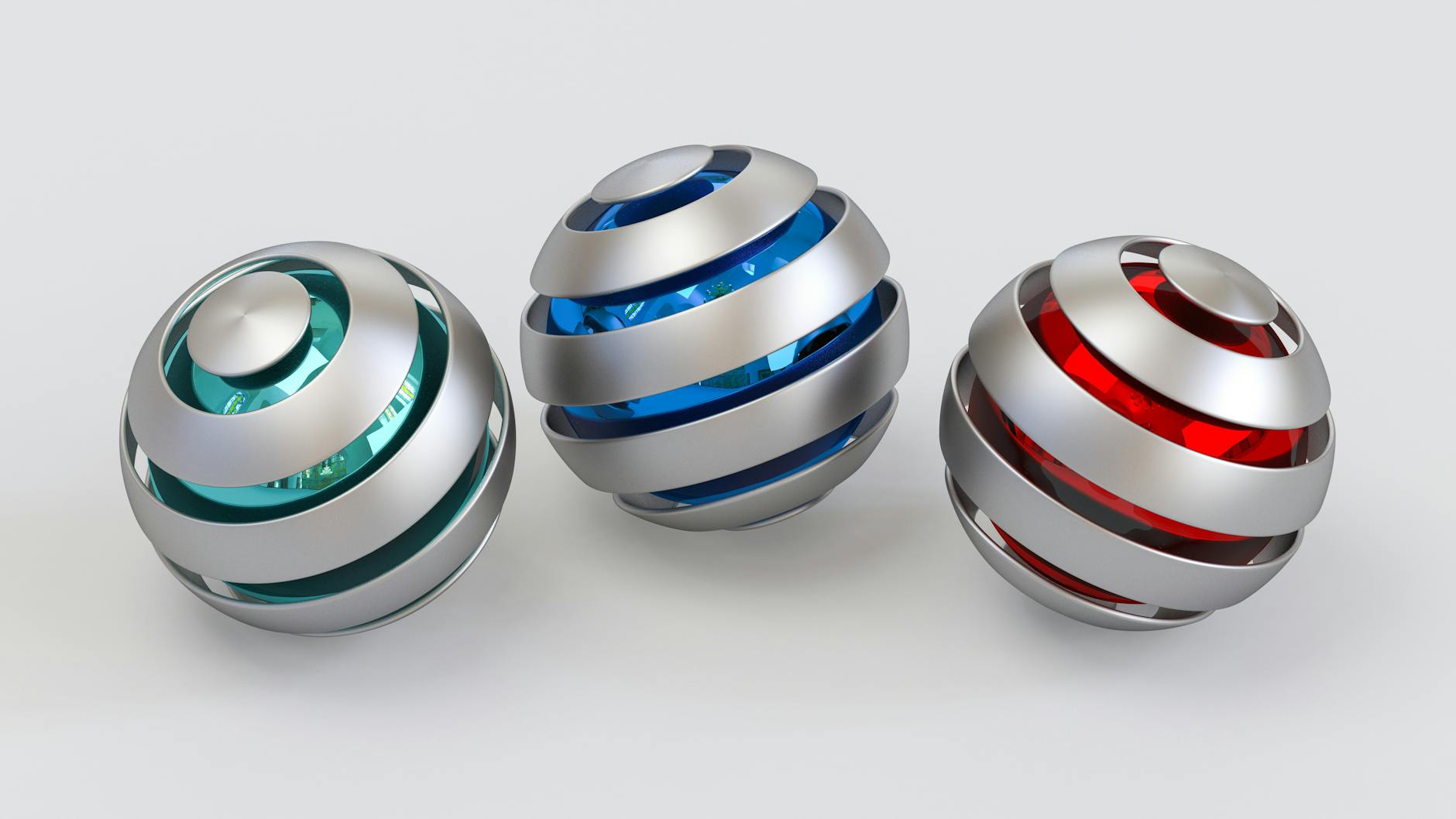 Three metallic spheres showcasing vibrant red, blue, and green accents, symbolizing modern technology.