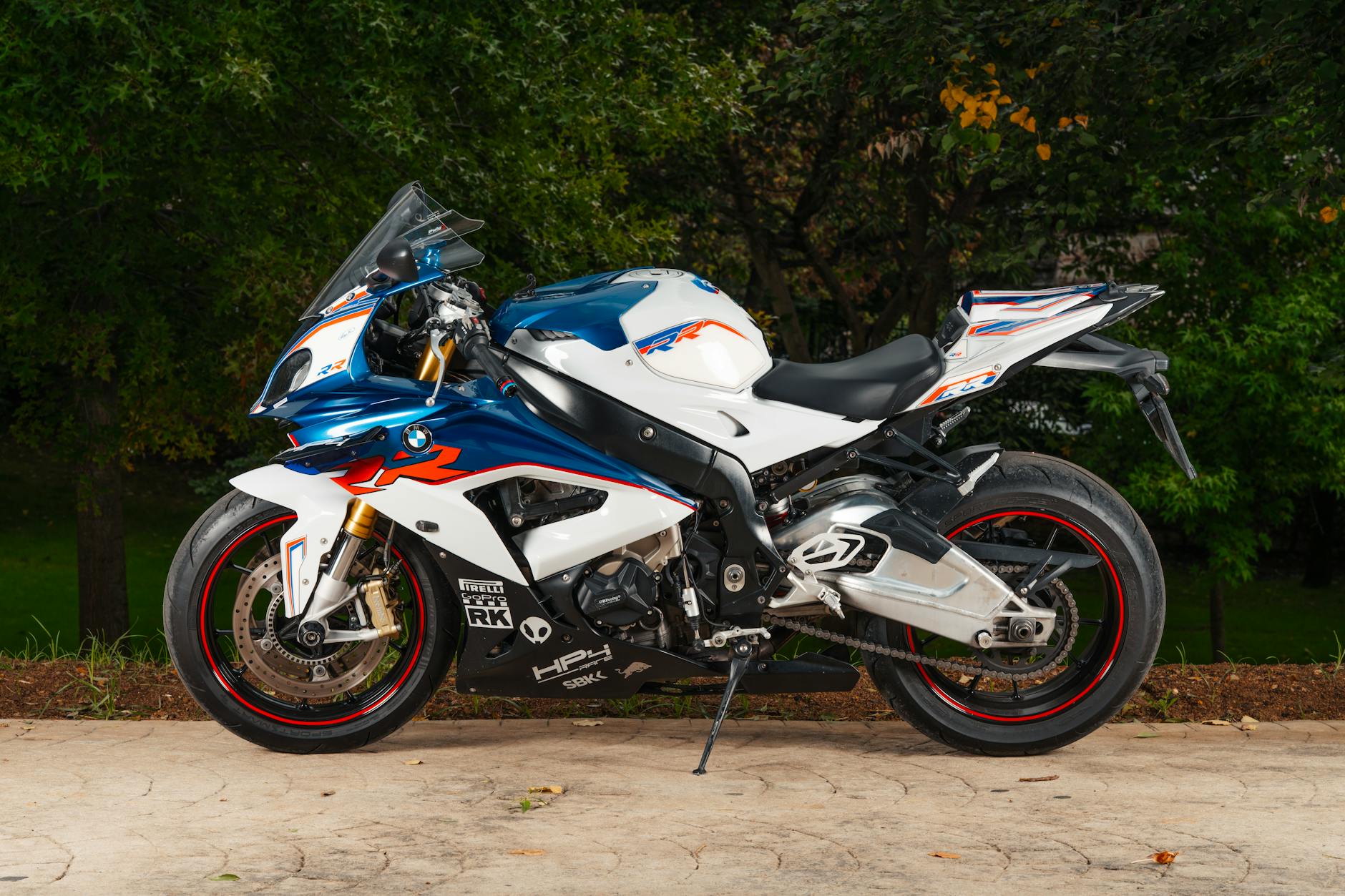 Side view of a high-performance sport motorcycle in a park setting in Istanbul.