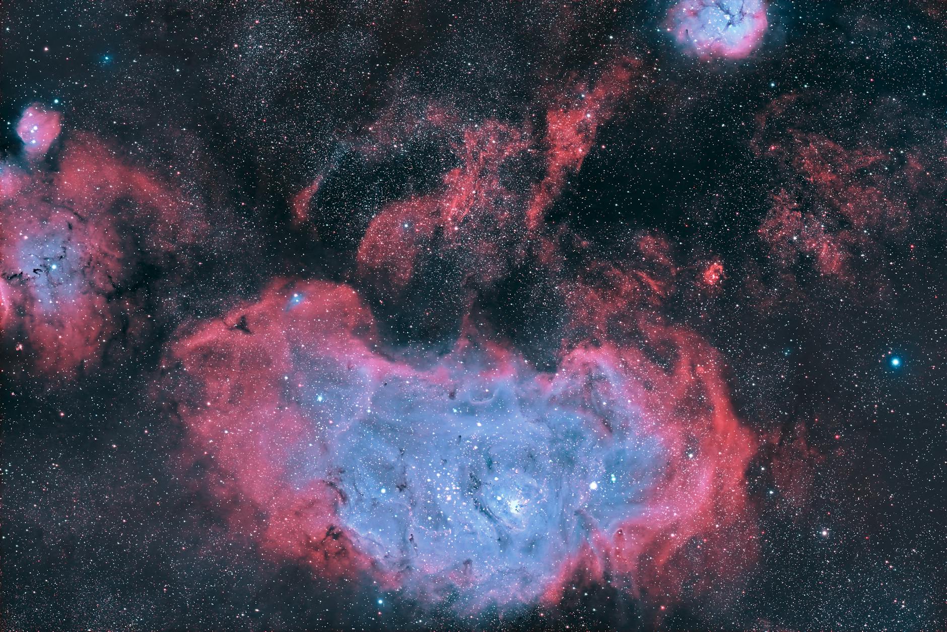 Breathtaking view of a vibrant nebula, showcasing cosmic colors and stars in deep space.