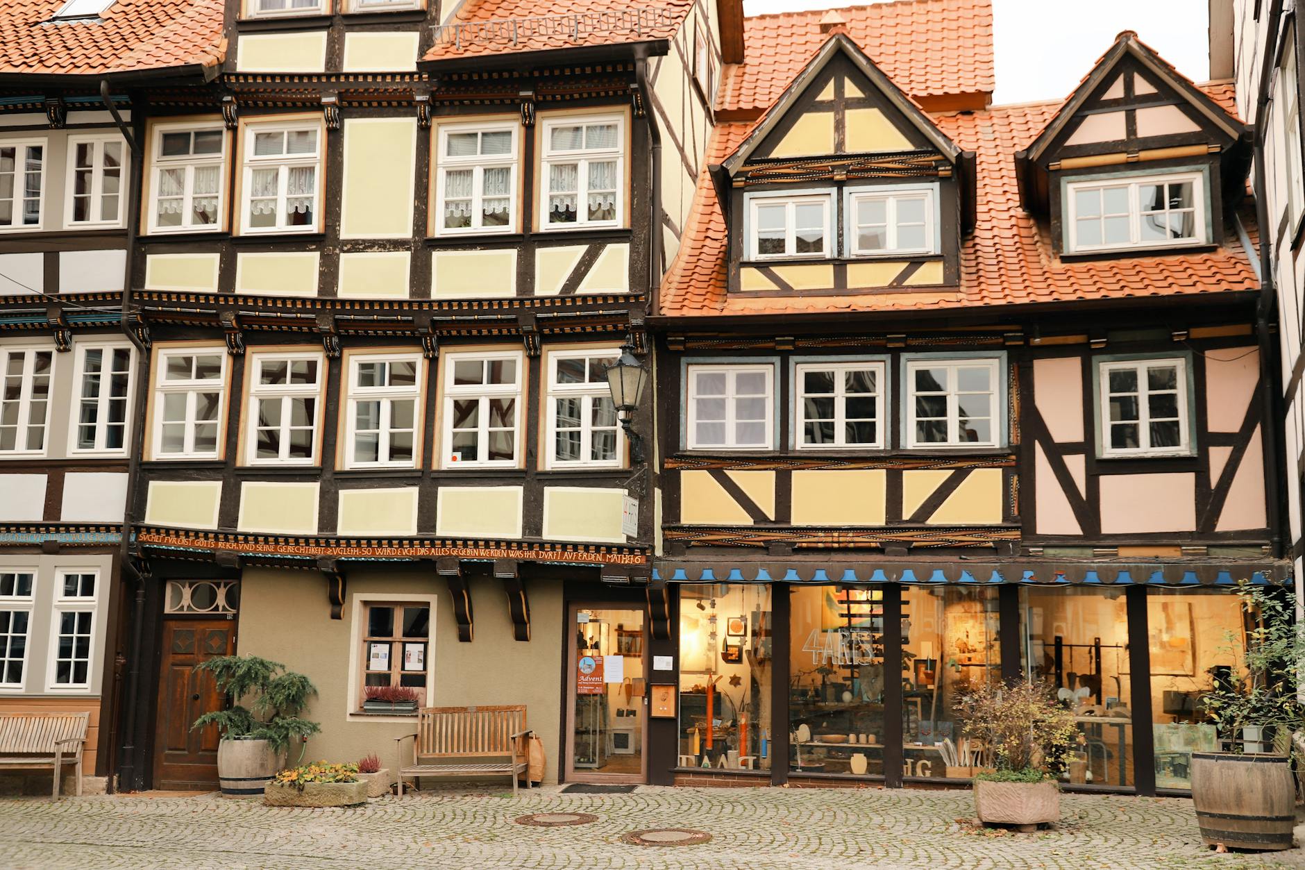 Picturesque half-timbered buildings lining a quaint street in Hann. Münden, Germany, showcasing beautiful architectural details.